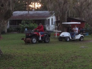 Neighbor pulling Marshall's dead Gulf Cart